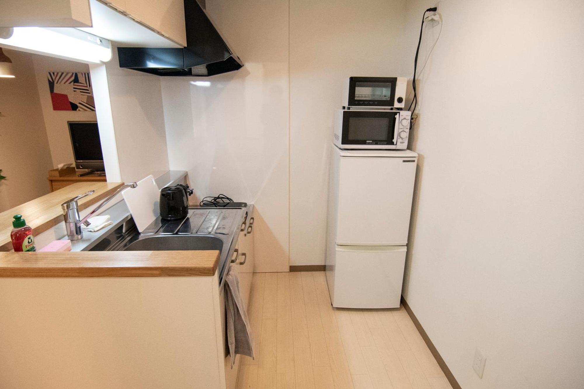 Tsubaki Garden Apartment Сапоро Стая снимка