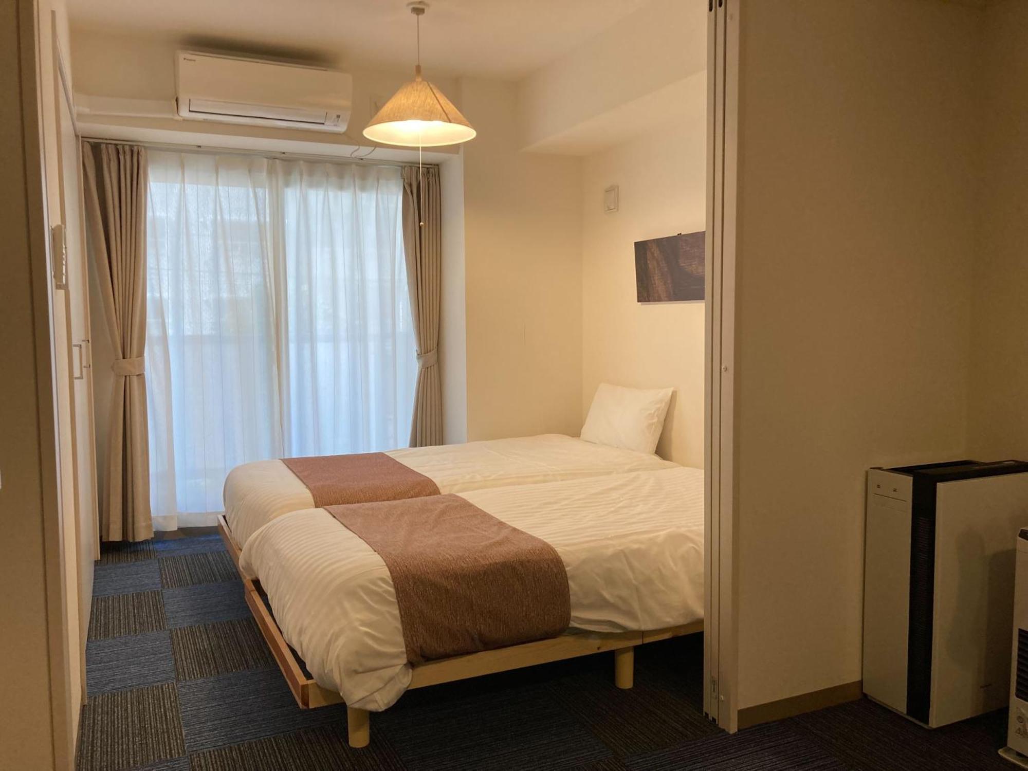 Tsubaki Garden Apartment Сапоро Стая снимка