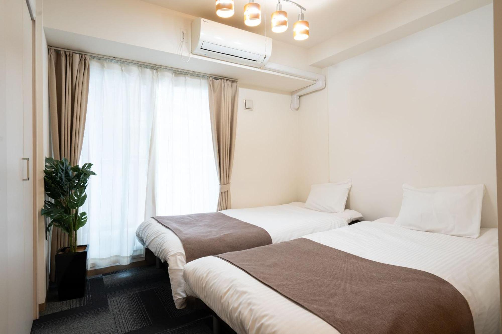 Tsubaki Garden Apartment Сапоро Стая снимка