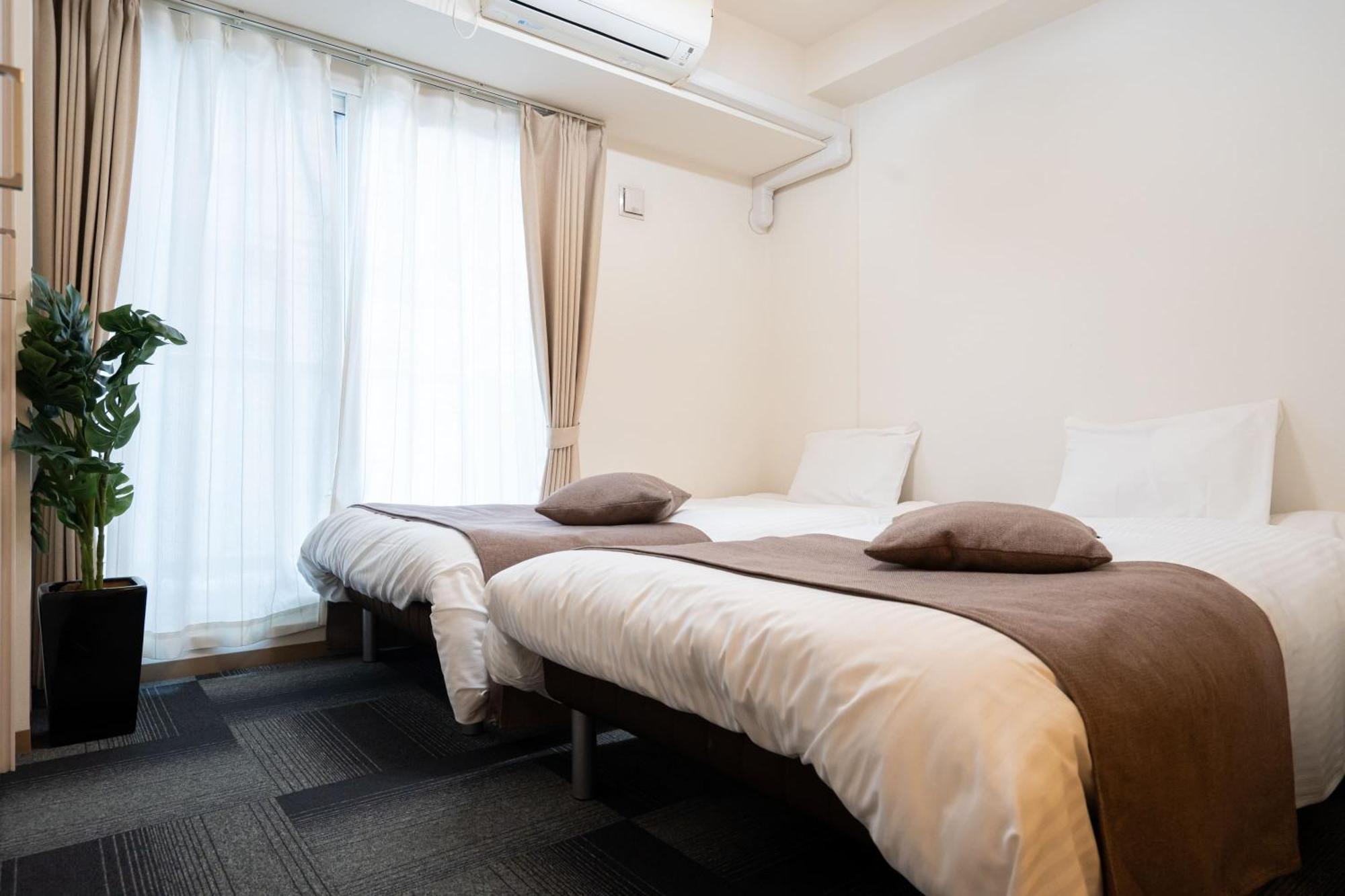 Tsubaki Garden Apartment Сапоро Стая снимка